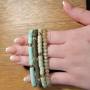 Set of 4 heishi and beaded green bracelets